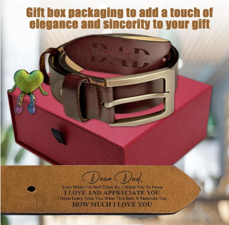 Brown leather belt with engraved message, metallic buckle, displayed on gift box for men