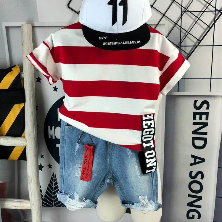 Red and white striped short-sleeve t-shirt, distressed denim shorts, white snapback hat