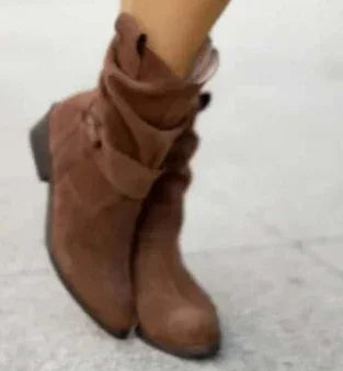 Brown suede slouch ankle boots with buckle detail and low block heel, casual streetwear style