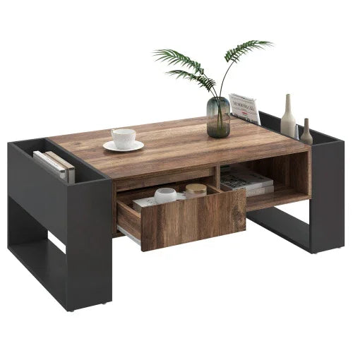Modern wood and black metal coffee table with storage drawer, open shelves, and decorative items on top.