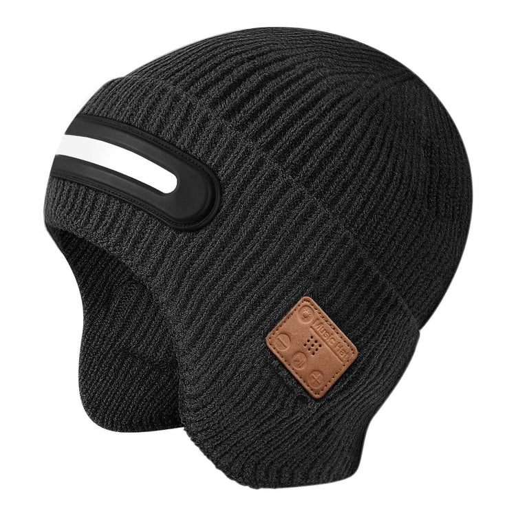 Black ribbed knit winter hat with reflective strip, ear flaps, and brown faux leather patch