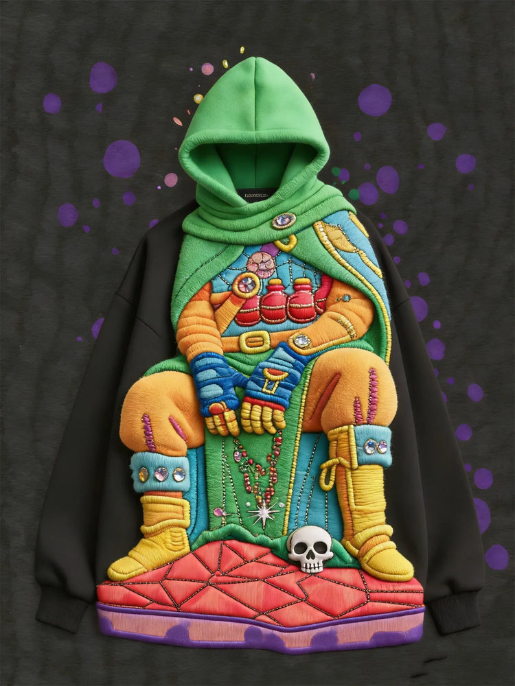 Oversized black hoodie with vibrant 3D embroidered fantasy character, green hood, plush textured details, and relaxed fit.