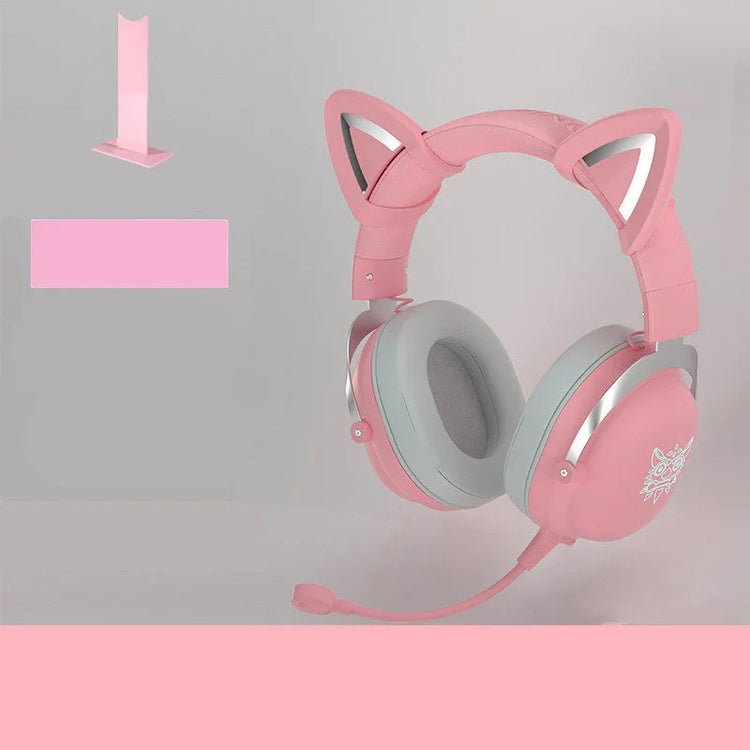 Pink over-ear headphones with cat ears and microphone, soft gray ear cushions, playful style
