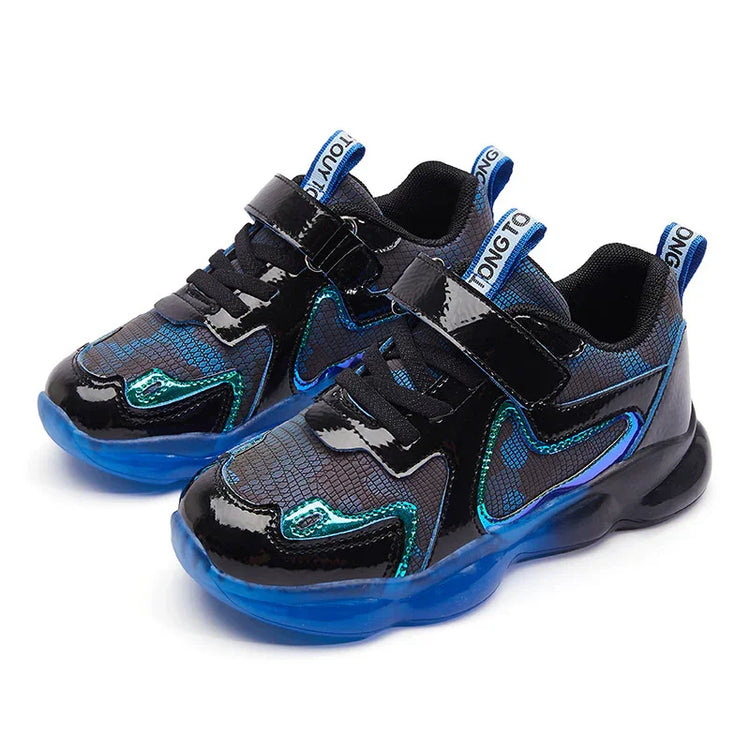 Futuristic black and blue sneakers with glossy finish, mesh details, and velcro strap.