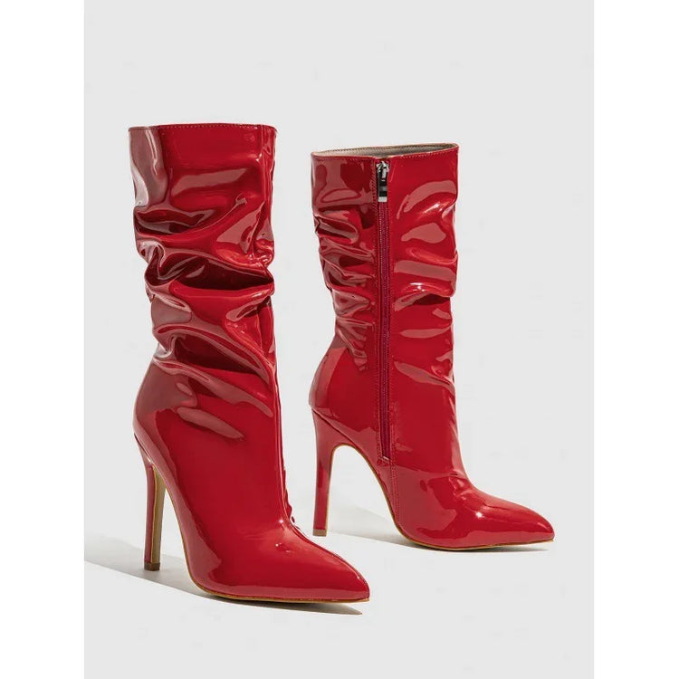 Red patent leather heeled boots with pointed toe and slouchy mid-calf fit