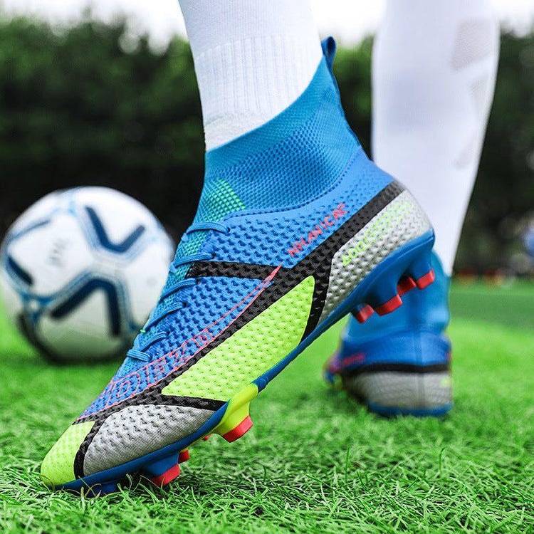 Blue and neon yellow soccer cleats with textured synthetic material and snug fit on grass field