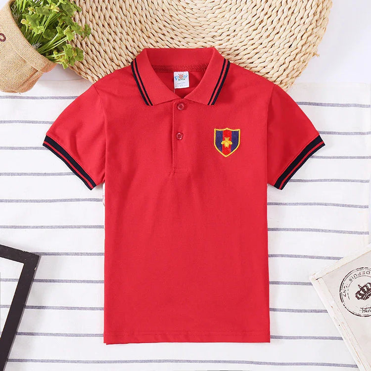 Red short-sleeve cotton polo shirt with black trim, embroidered crest, classic fit