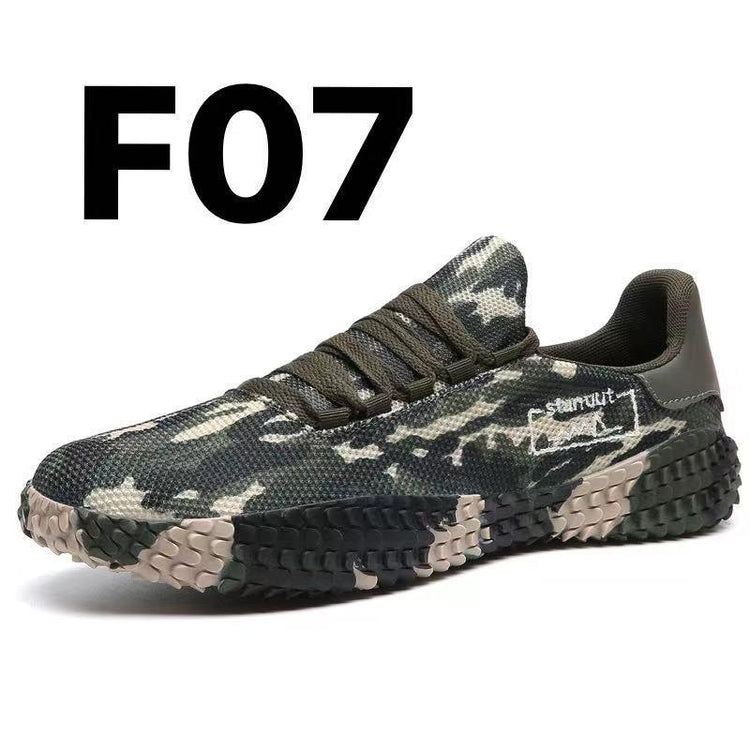 Green camouflage athletic sneaker with mesh material, chunky sole, and low-top fit