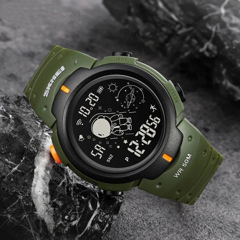 Green digital sports watch with black bezel and astronaut display, durable rubber strap