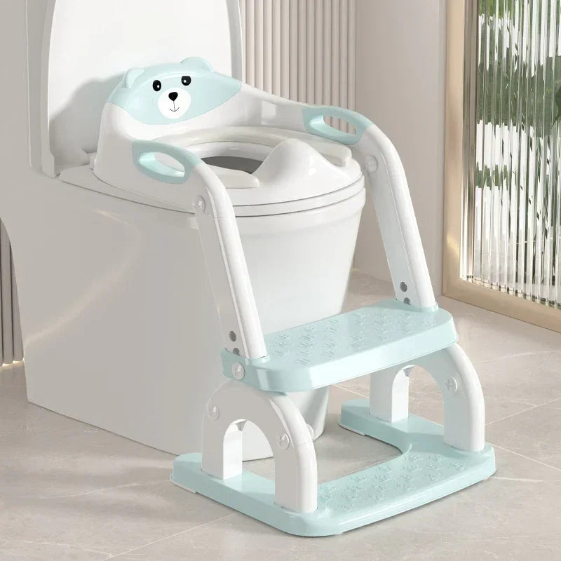 Light blue and white toddler potty training toilet seat with safety handles and steps