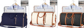 Three travel garment bags in navy, cream, and black with brown leather trim, displayed with dress shirts.