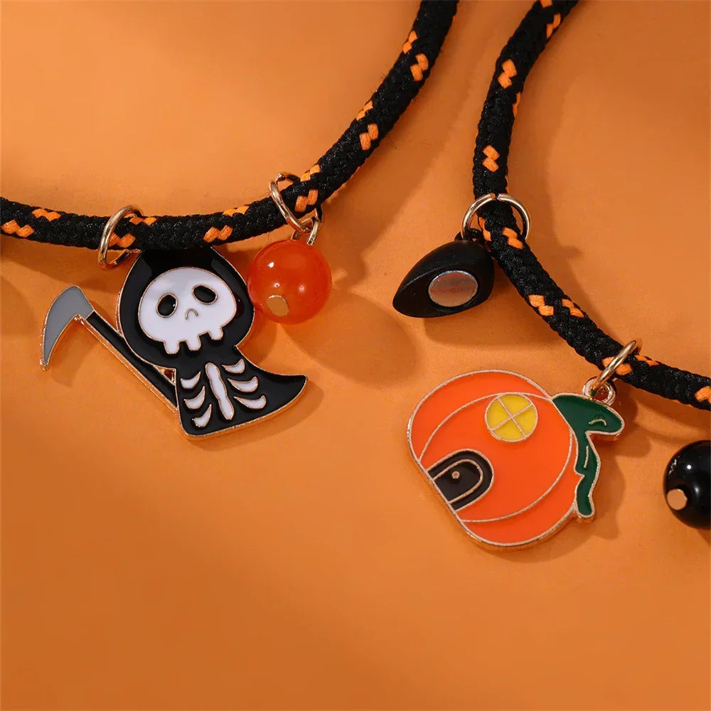 Black and orange braided cord necklaces with enamel Halloween pendants, pumpkin and skeleton charms