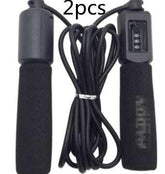 Two black foam handle jump ropes with digital counter, long cord, fitness accessory
