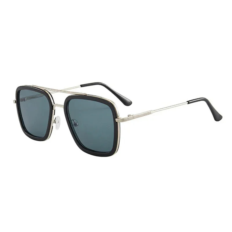 Square sunglasses with black lenses, silver metal frame, and modern streetwear style.