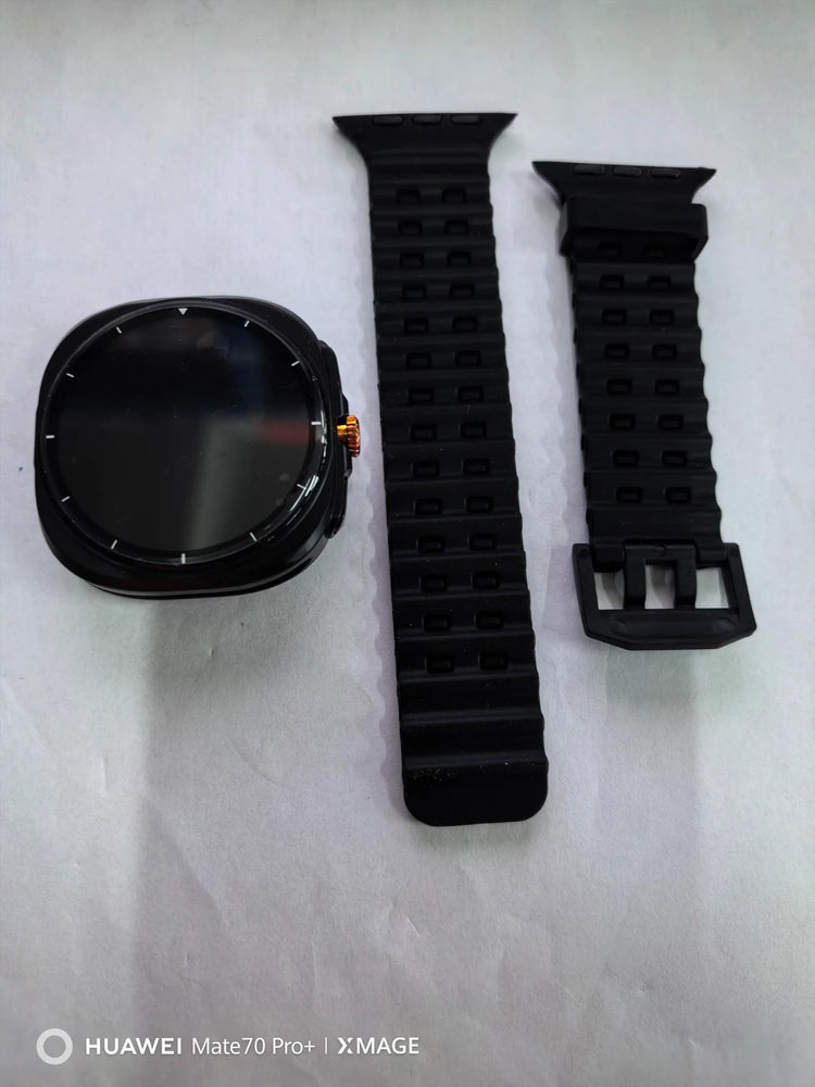 Black silicone watch band and case, modern design, shown unassembled on white background