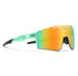 Futuristic mint green sports sunglasses with orange mirrored lenses and angular frame.