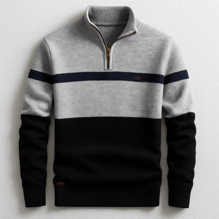 Men’s colorblock knit pullover with half-zip, featuring grey, navy, and black panels, regular fit