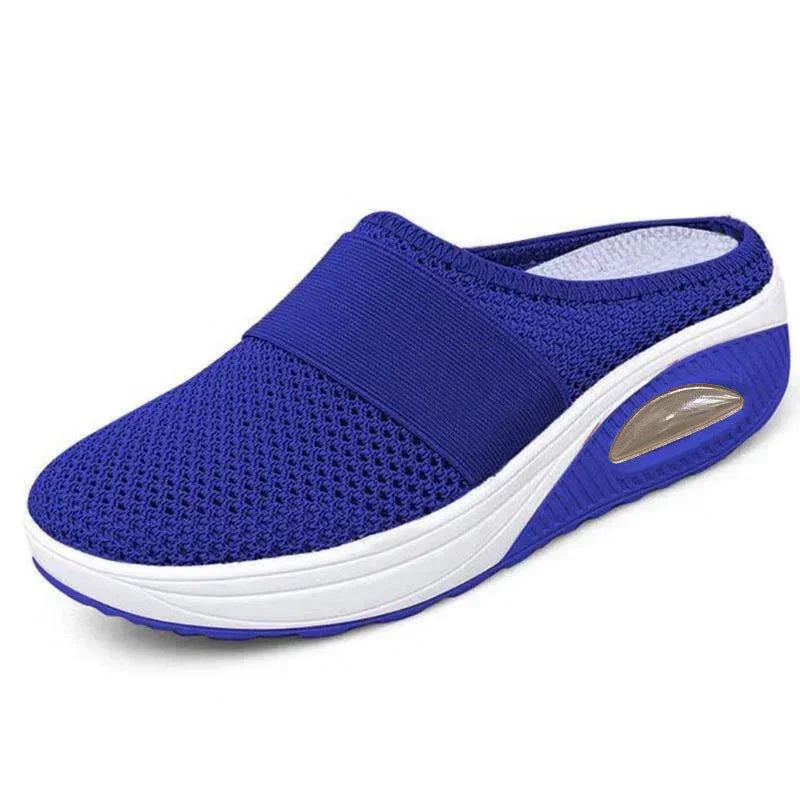 Breathable blue mesh slip-on sneaker with cushioned white sole and ergonomic fit
