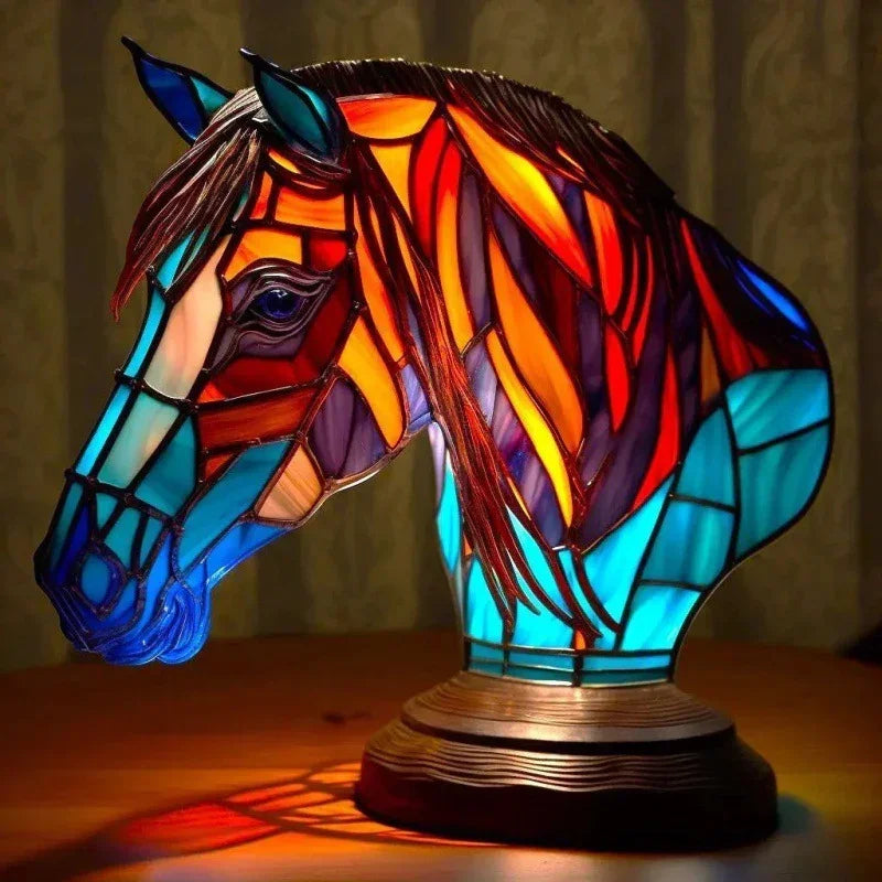 Colorful stained glass horse head lamp with blue, orange, and red geometric patterns.