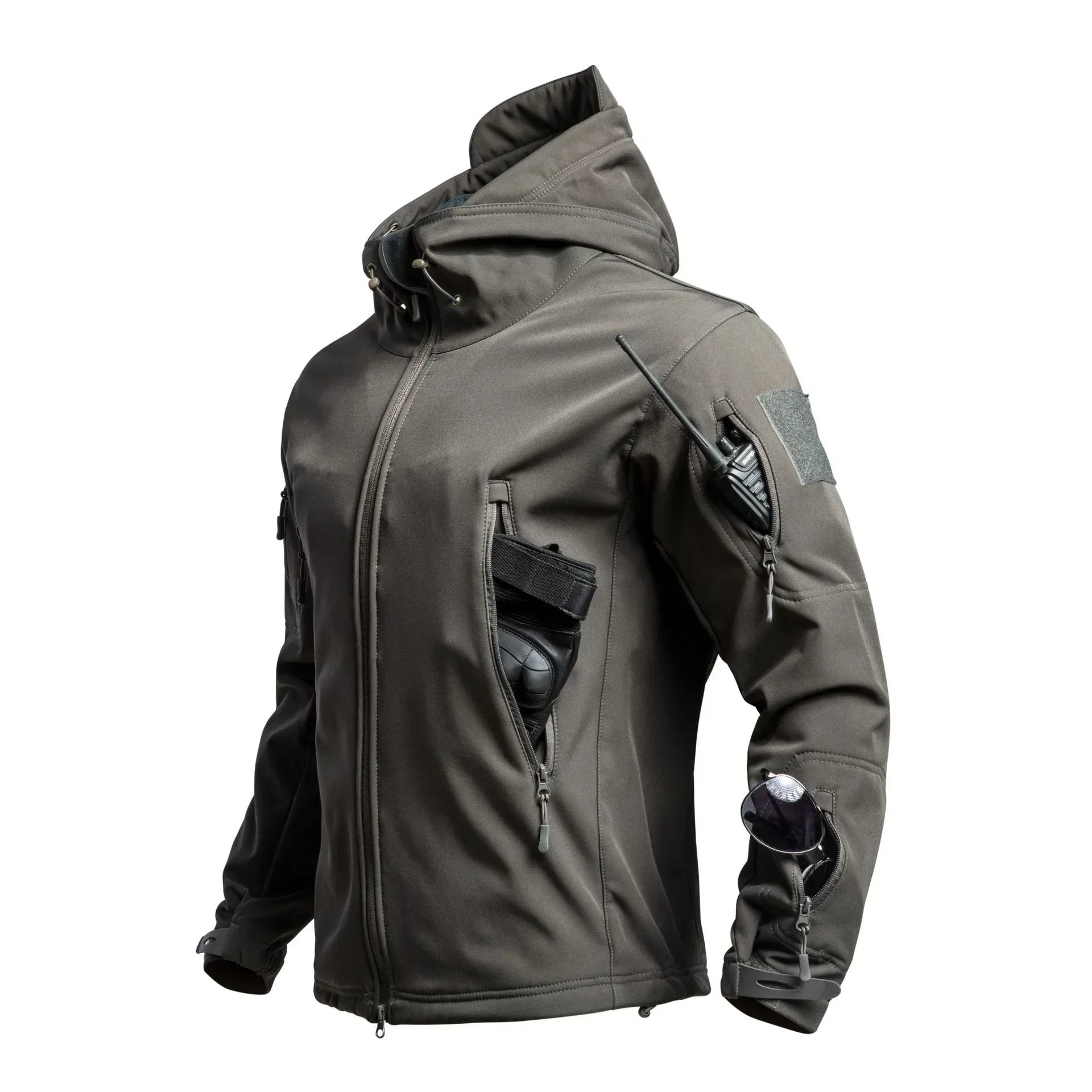 Futuristic dark gray softshell jacket with multiple zippered pockets, tactical fit, and hood.