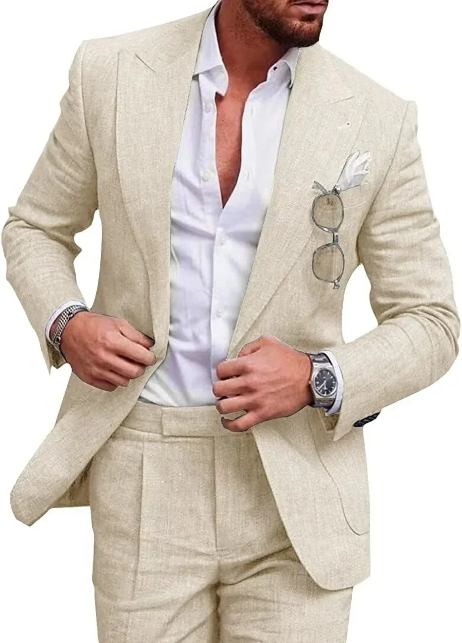 Beige linen suit with tailored fit, white dress shirt, and pocket square, styled for men