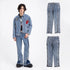 Man wearing light blue denim jacket with patches and straight-leg zipper jeans, streetwear style