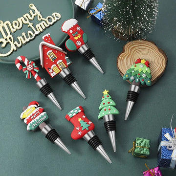 Set of festive Christmas silicone wine bottle stoppers in various holiday shapes on green background