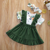 Green ruffle suspender skirt with floral short sleeve top and matching headband, cotton, toddler size.