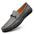 Gray leather loafer with metal buckle, moc toe stitching, and slip-on casual fit