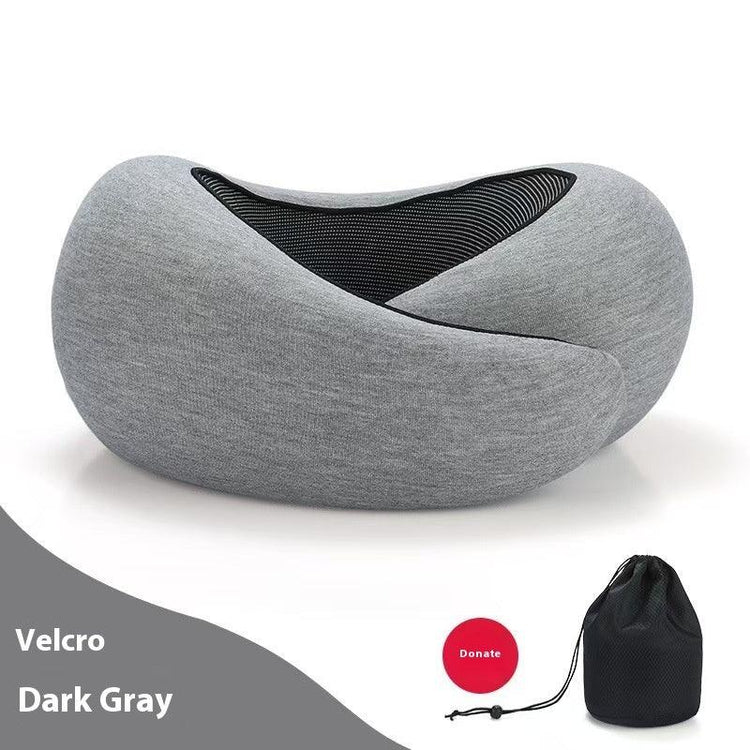 Dark gray ergonomic travel pillow with soft fabric and mesh panel, shown with storage bag.