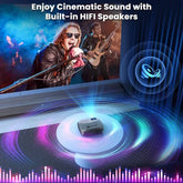 Projector on floor displaying vibrant concert scene, highlighting built-in HiFi speakers.