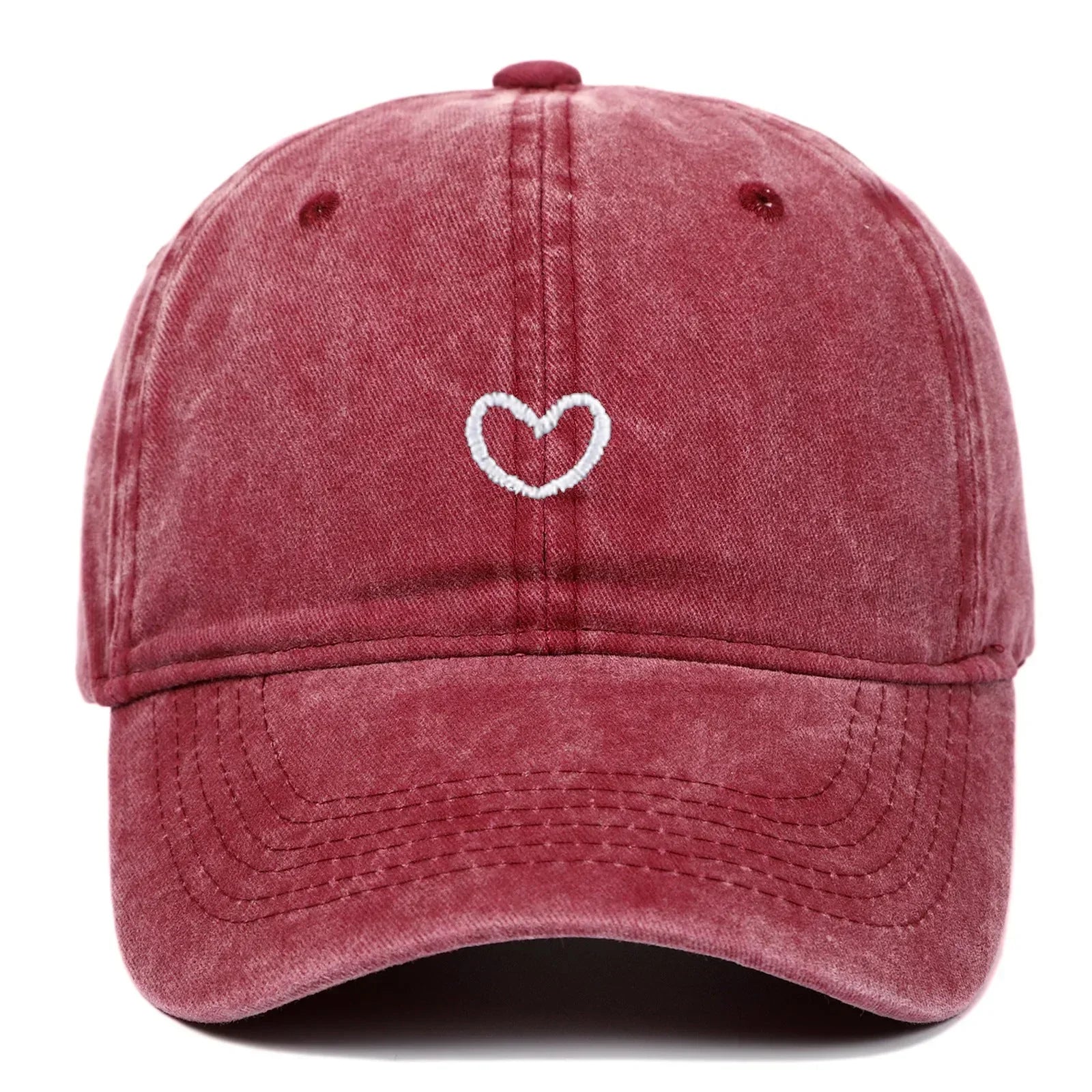 Washed red cotton dad hat with white embroidered heart, curved brim, relaxed fit