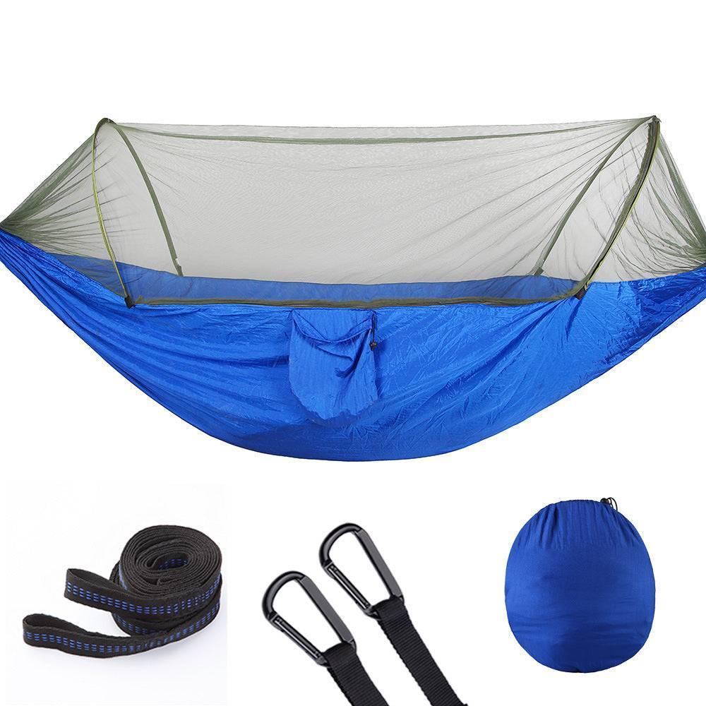 Blue nylon hammock with mosquito net, suspension straps, carabiners, and storage bag