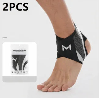 Black and gray elastic ankle support sleeve, breathable fabric, ergonomic fit for sports.