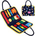 Colorful children’s activity bag with zippers, buckles, and felt shapes on dark fabric