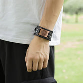 Black leather bracelet with brown engraved metal plate, casual fit streetwear style