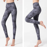 Gray high-waisted leggings with black dragonfly print, slim fit, stretchy fabric