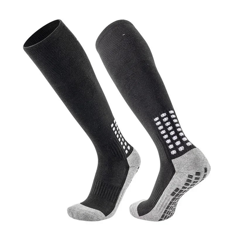 Black and gray knee-high socks with non-slip grip soles, athletic fit, ribbed material