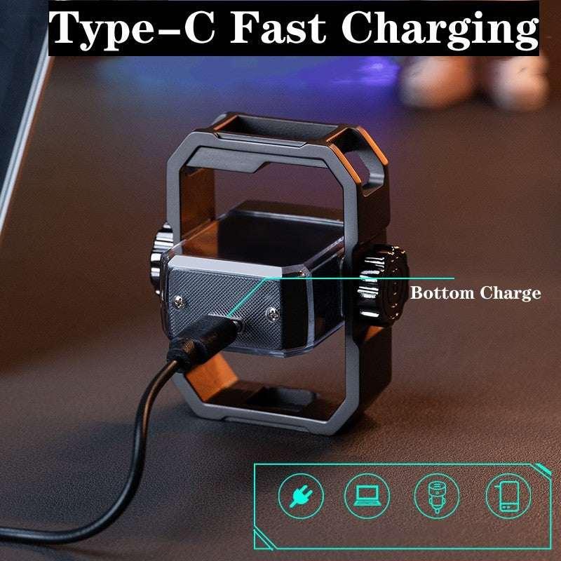 Metal phone holder with Type-C fast charging cable connected, modern desktop setting.