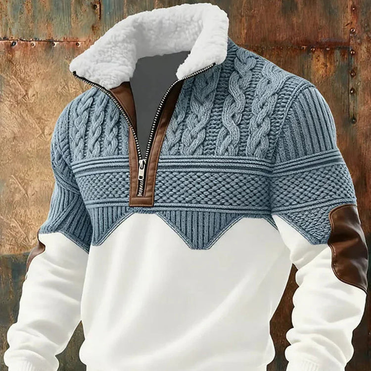 Cable knit blue and white pullover with faux fur collar, brown leather accents, relaxed fit
