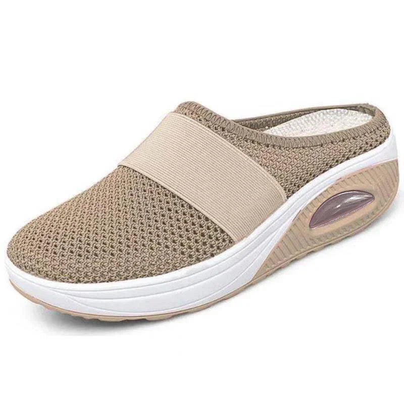 Beige slip-on mesh sneaker with stretch band, breathable upper, cushioned sole, casual fit
