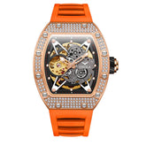 Rose gold diamond-studded skeleton watch with orange silicone strap, modern fit
