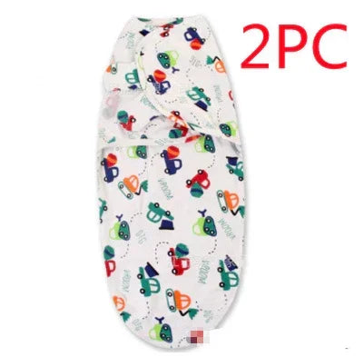 White baby swaddle blanket with colorful cartoon car print, soft cotton, snug fit, 2 pieces