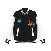Black and white varsity jacket with bold patches, striped cuffs, and relaxed fit streetwear style
