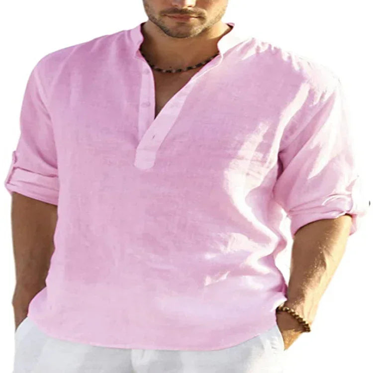 Men's light pink linen long sleeve shirt with relaxed fit and rolled-up sleeves