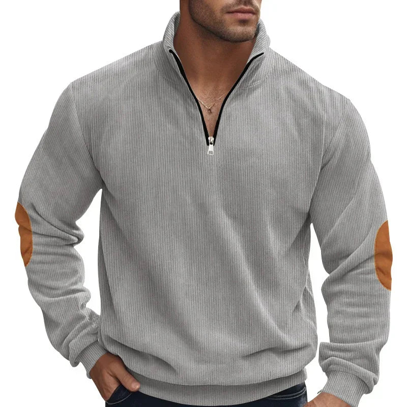Men's light grey ribbed pullover with brown suede elbow patches and half zip, relaxed fit