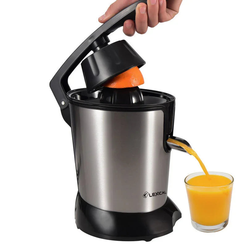 Electric stainless steel juicer squeezing fresh orange juice into a glass