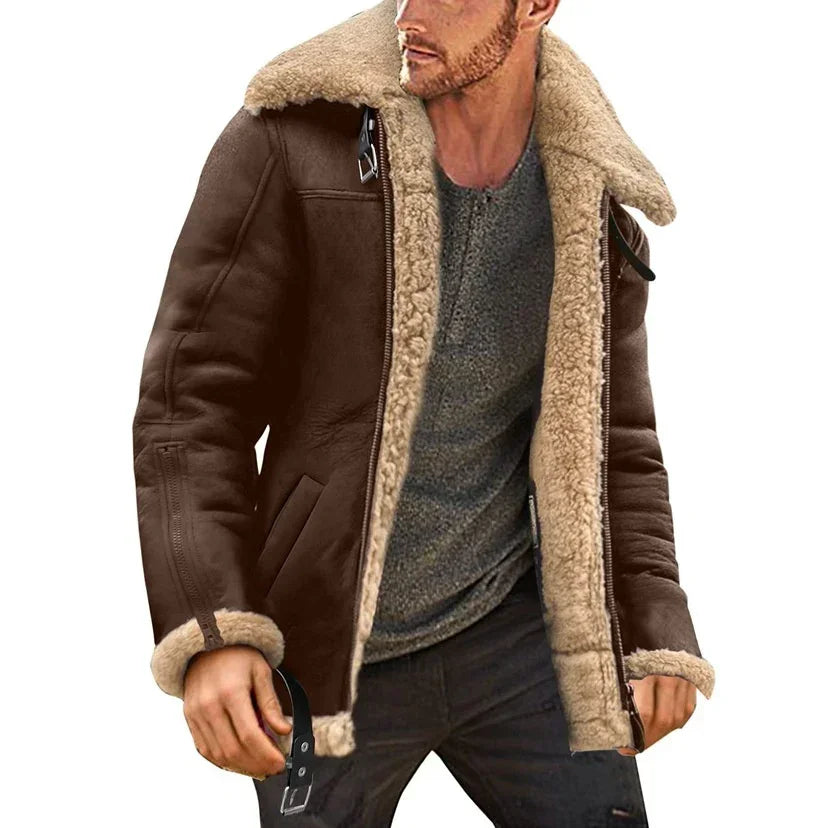 Men's brown shearling bomber jacket with beige faux fur lining, oversized collar, and relaxed fit