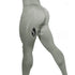 High-waisted grey leggings, slim fit, stretchy fabric, futuristic streetwear style.