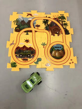 Dinosaur-themed play mat puzzle with a green toy jeep and illustrated track on yellow tiles.